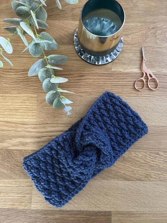 Twisted pine ear warmer